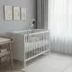 Pince flexible pour caméra et moniteur - Support universel DIXSG Pince flexible DIXSG fixée à un lit bébé avec une caméra de surveillance